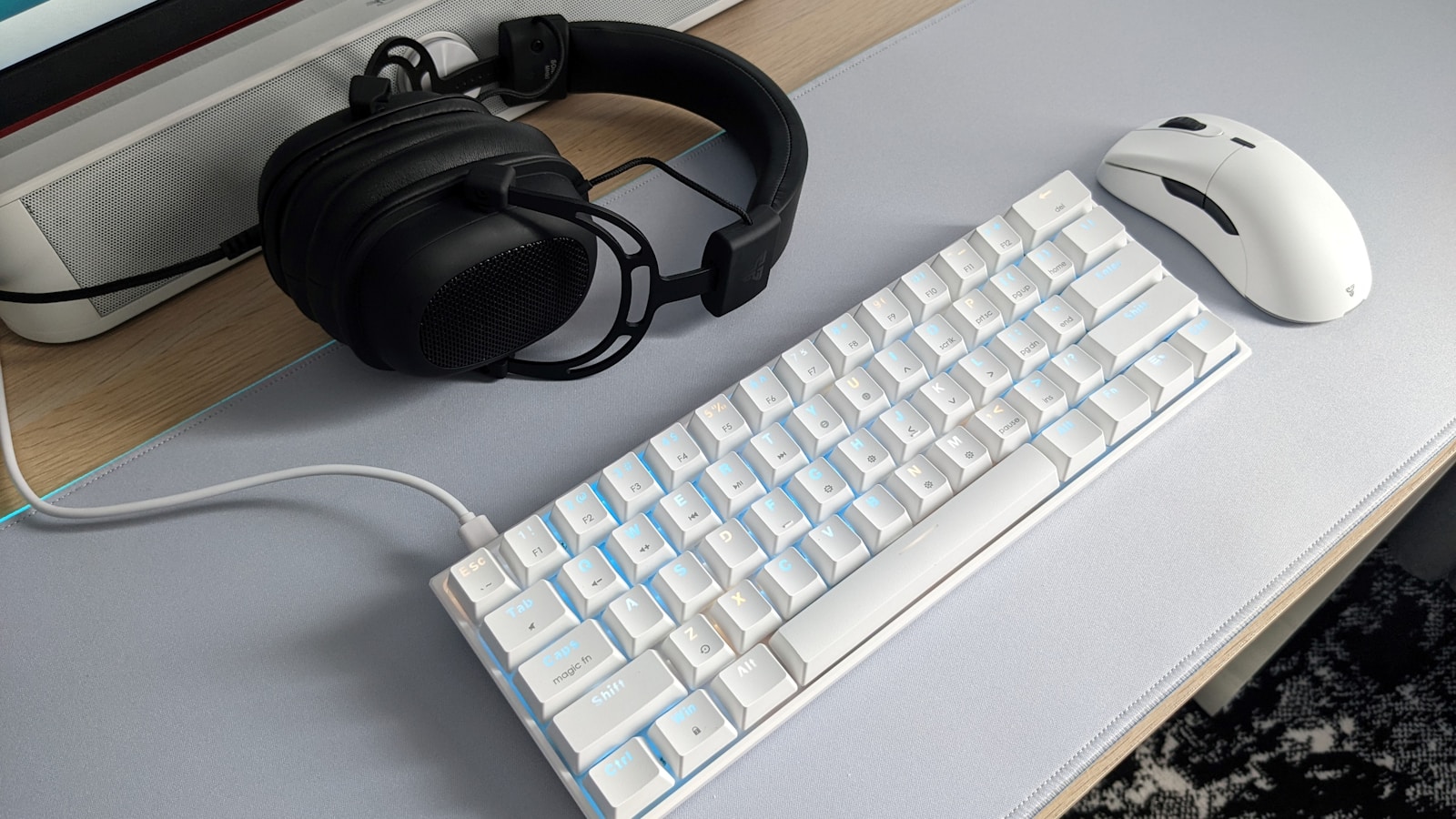 a keyboard and mouse on a desk